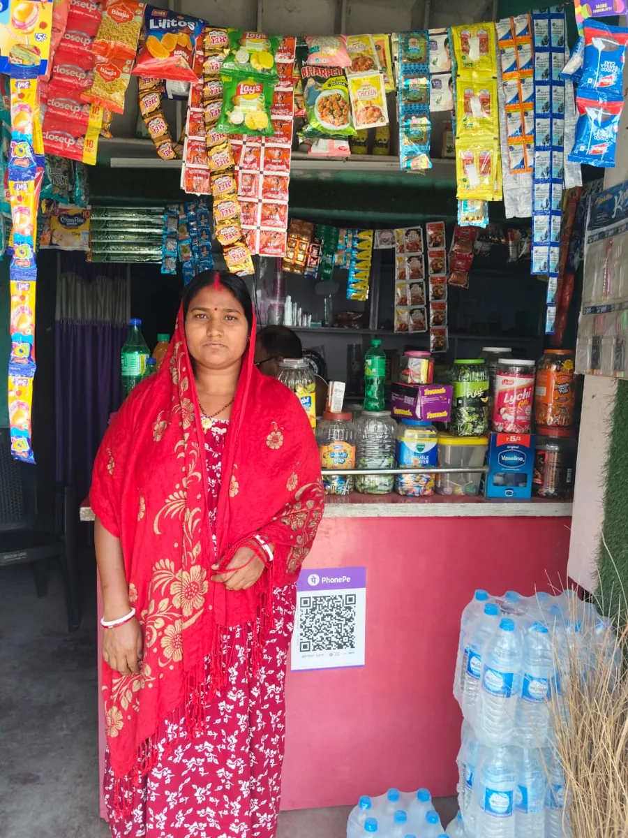 Borrower at her shop
