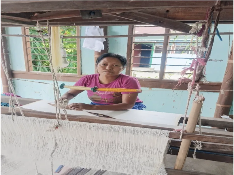 Weaver at her loom