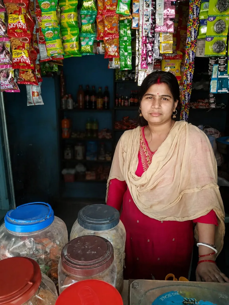 Borrower at her grocery shop
